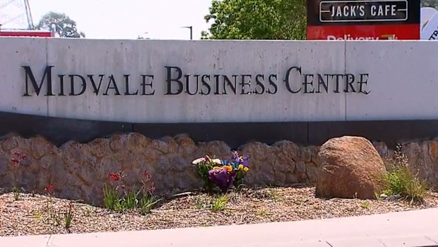 Witnesses returned to the scene with flowers for the young mother on Saturday afternoon.