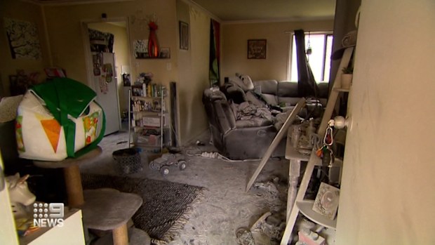 A Queensland family home has been spared from an e-scooter explosion after a neighbour came to the rescue with a fire extinguisher. The house took significant internal damage after the e-scooter that was plugged in to charge in the living room exploded inside the home in Darra in Brisbane at 4am.