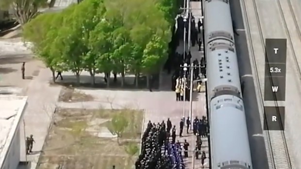 Disturbing video shows hundreds of blindfolded prisoners in China