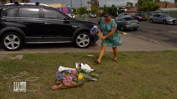Locals lay flowers near where Mr Palmer died.