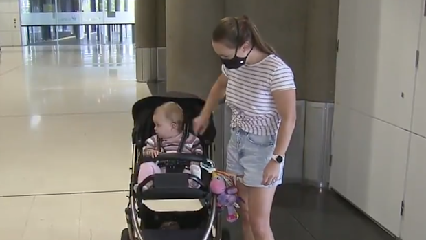 One of those people is Ashlee Christensen's husband, who was meant to be home weeks ago but has been stuck in Sydney since the freeze was imposed.