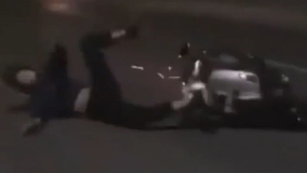 Carr is accused of fly-kicking a scooter rider off their bike.
