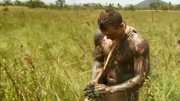 Zack quickly slathered himself in mud to escape the heat.
