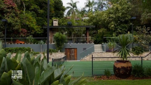 The river front property features a tennis court, infinity pool, private library wine cellar, decked out with handcrafted furniture and original sculptures.