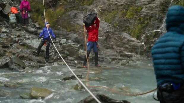 The Summit 2023: The trekkers throw cash over a waterfall