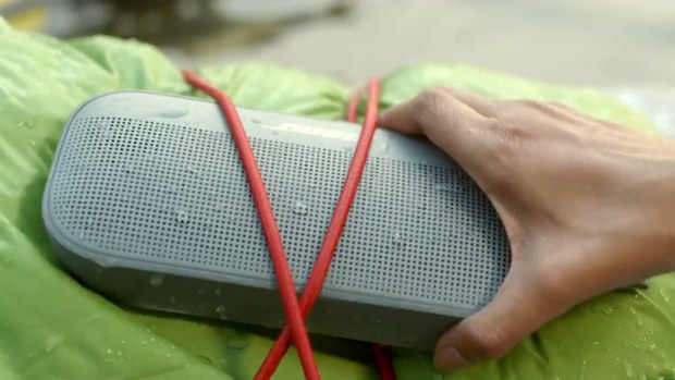 9PR: The Bose SoundLink Flex Bluetooth Portable Speaker being packed in a backpack