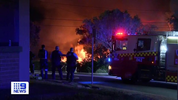 A ferocious and suspicious fire destroyed a two-storey family home in Sydney's south-west on Saturday night, less than 36 hours after police raided the property.