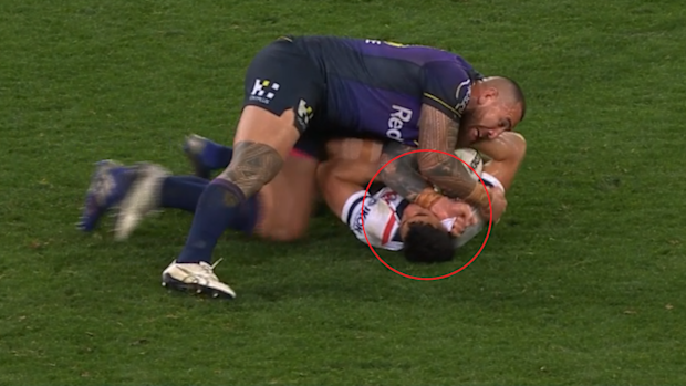 Storm prop Nelson Asofa-Solomona digs his elbow into the head of Joseph Suaalii.