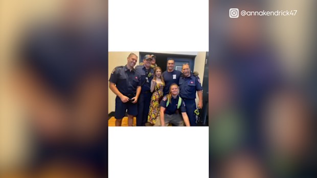 Anna Kendrick gets saved from an elevator by a group of Canadian firefighters.