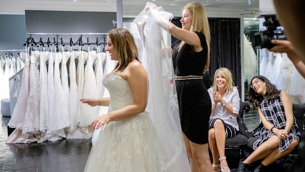 Her friends are excited to see her don the veil.