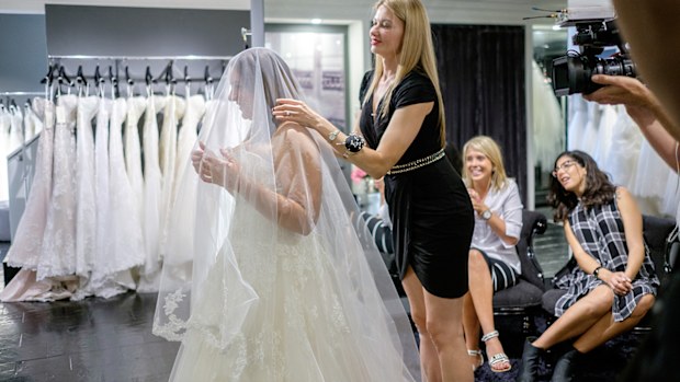 Her friends are excited to see her don the veil.