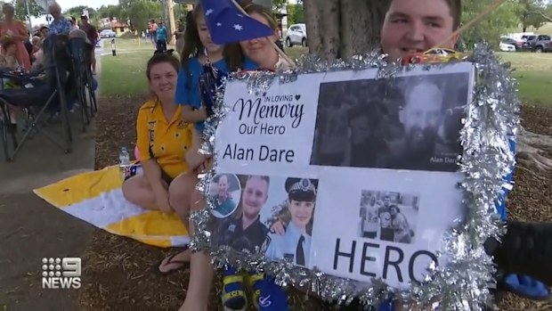 Hundreds lined the streets to pay their respects as Dare was escorted by a police motorcade.