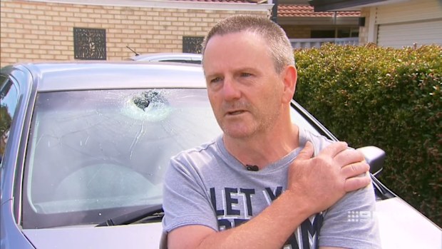 Bill Wells was left with glass shards in his eye and a sprained shoulder after rocks were thrown from Mandurah overpass.