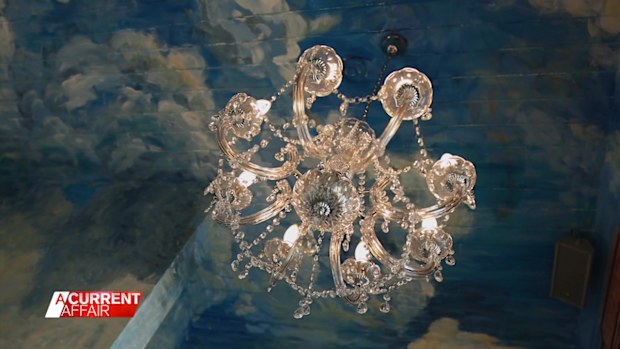 Bates and a team of locals then bought chandeliers and other decorations to transform the bathrooms into a work of art.