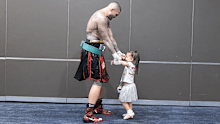 Tyson Pedro celebrates with his daughter.