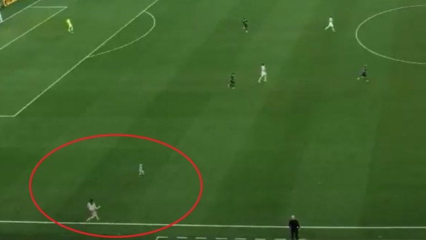 Toddler and mum on soccer field