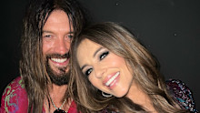 Elizabeth Hurley and Billy Ray Cyrus at the premiere of Something Beautiful