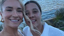 The soon-to-be wed couple matched in white.