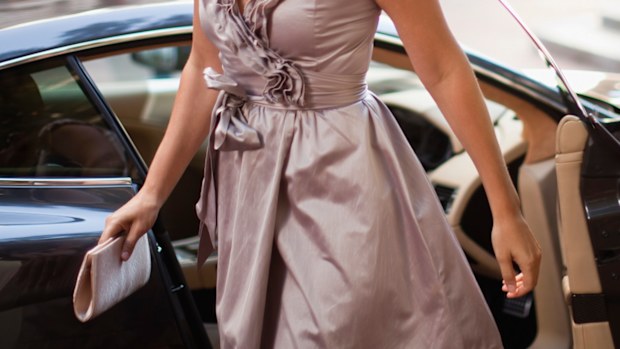 Woman with expensive car