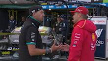 Kostecki and Mostert in pit lane. 