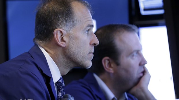 $A steady, iron ore drops, Wall St slides