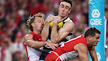 Jeremy Cameron of the Cats takes the ball late in the match before being denied a mark.