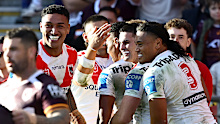 BRISBANE, AUSTRALIA - MAY 31: Setu Tu of the Dragons is congratulated by team mates after scoring a try during the round 13 NRL match between Brisbane Broncos and St George Illawarra Dragons at Suncorp Stadium, on May 31, 2026, in Brisbane, Australia. (Photo by Bradley Kanaris/Getty Images)