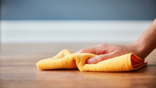 Cleaning a surface with a cloth, dusting, microfibre cloth