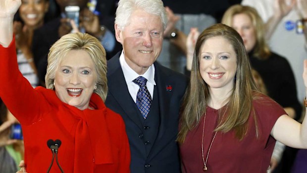 Hillary Clinton with her husband Bill and daughter Chelsea. (AAP)