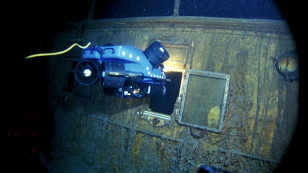 An underwater remote vehicle examines an open window of the Titanic 3.8 kilometres below the surface of the ocean, 640 kilometres off the coast of Newfoundland, Canada in 1986.