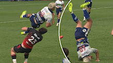 Stephen Perofeta is upended by Kurtis MacDonald. 