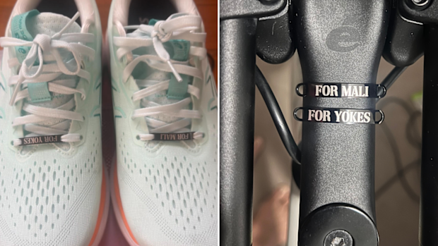 Kirsty Nichols' runners and bike with her tributes to her two daughters.