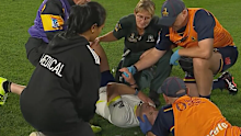 Referee Angus Gardner receives medical attention during the round six Super Rugby match.