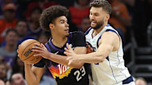 Cameron Johnson shields the ball from Maxi Kleber.