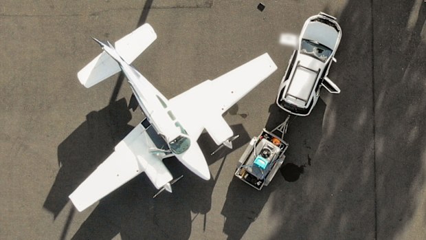 Two men piloted the unauthorised flight from regional town of Monto, northwest of Brisbane, to Bulolo.