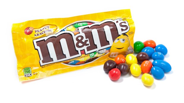 Toronto, Canada - May 10, 2012: This is a studio shot of M&M's milk chocolate candies made by Mars, Incorporated isolated on a white background.