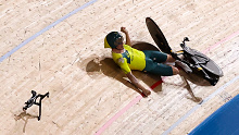 Australia's Alexander Porter falls during the men's team pursuit qualifying cycling track event during the 2020 Summer Olympic Games.