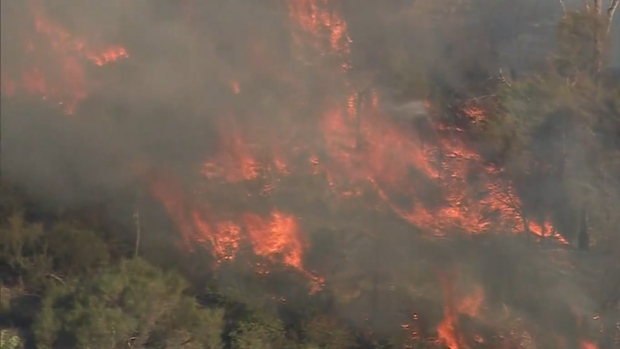 Residents are being warned to prepare as a bushfire threatens homes in Perth's northeast.