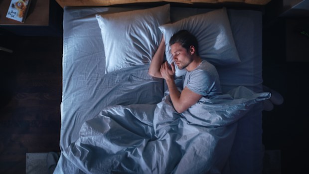 Man asleep in bed for stud on sleep