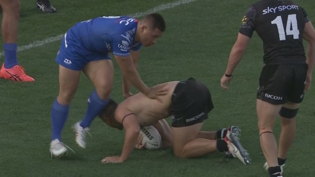Joey Manu took a hit up while shirtless after it was ripped off in a previous tackle.