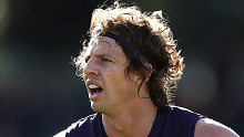 CANBERRA, AUSTRALIA - AUGUST 20: Nat Fyfe of the Dockers looks on during the round 23 AFL match between the Greater Western Sydney Giants and the Fremantle Dockers at Manuka Oval on August 20, 2022 in Canberra, Australia. (Photo by Mark Metcalfe/AFL Photos/via Getty Images)