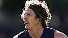 CANBERRA, AUSTRALIA - AUGUST 20: Nat Fyfe of the Dockers looks on during the round 23 AFL match between the Greater Western Sydney Giants and the Fremantle Dockers at Manuka Oval on August 20, 2022 in Canberra, Australia. (Photo by Mark Metcalfe/AFL Photos/via Getty Images)