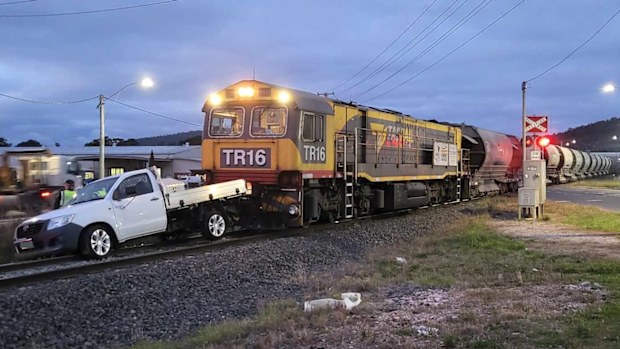 A ute has been hit by a train and pushed along the tracks in Devonport in Tasmania's north west.