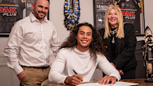 Chiefs general manager of football Michael Chammas, marquee signing Jarome Luai, and CEO Lorna McPherson.