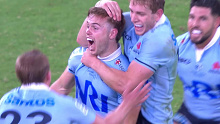 Waratahs celebrate their Golden Point win over the Crusaders at the Sydney Football Stadium.