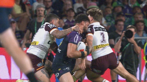 Reece Walsh collects Xavier Coates high.