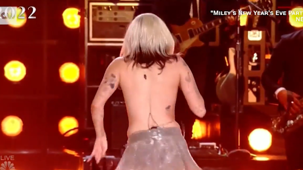 Miley Cyrus recovers seamlessly from awkward wardrobe malfunction on stage for 'Miley's New Year's Eve Party' broadcast by NBC.