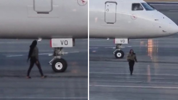 Woman arrested after running onto tarmac at Canberra Airport | Nine.com.au