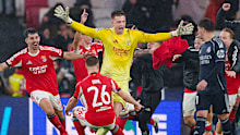  Goalkeeper Anatoliy Trubin of SL Benfica celebrates his goal with teammates during the UEFA Champions League 2025/26 League Phase MD8 match between SL Benfica and Real Madrid CF at Estádio da Luz on January 28, 2026 in Lisbon, Portugal. 