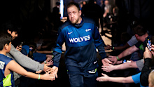 MINNEAPOLIS, MINNESOTA - APRIL 13: Joe Ingles #7 of the Minnesota Timberwolves takes the court with his team before the game against the Utah Jazz at Target Center on April 13, 2025 in Minneapolis, Minnesota. 